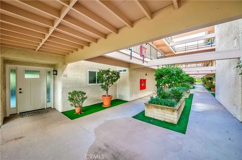 Photo of 5519 Paseo Del Lago #1A, Laguna Woods, CA 92637 (MLS # PW25240526)