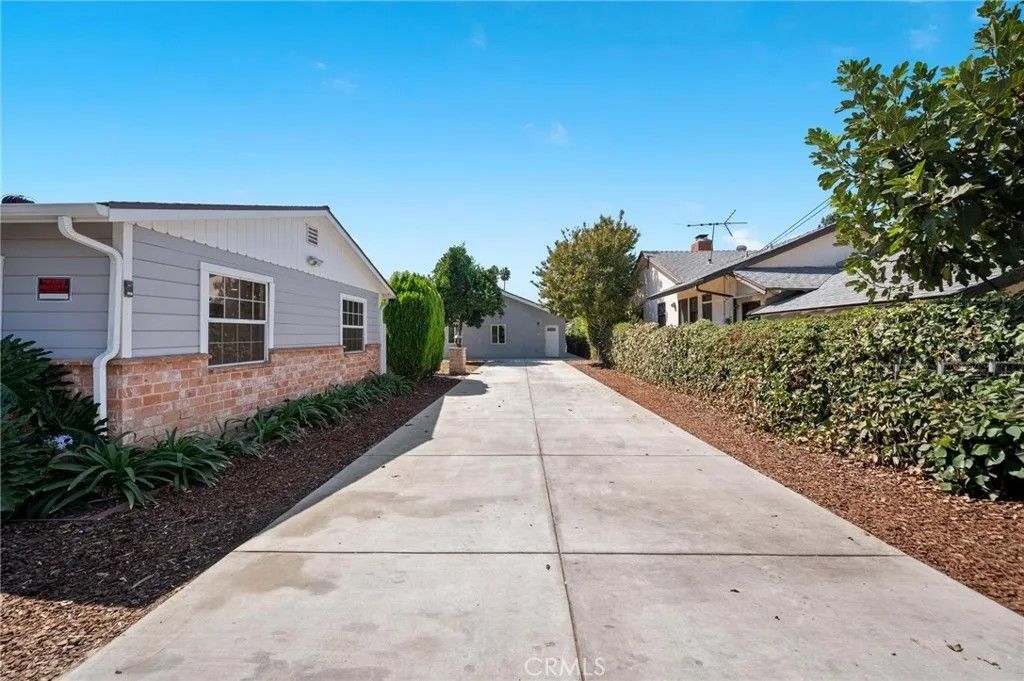 Photo of 7445 Balcom Avenue, Reseda, CA 91335 (MLS # SR26039086)