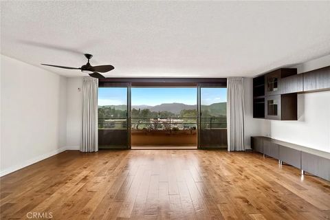 Photo of 24055 Paseo Del Lago #1355, Laguna Woods, CA 92637 (MLS # OC26036625)