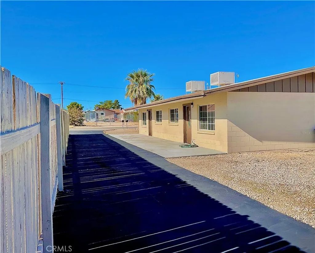 Photo of 6455 Tamarisk, 29 Palms, CA 92277 (MLS # JT25252671)