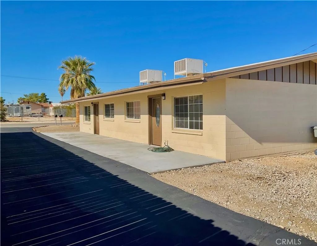 Photo of 6455 Tamarisk, 29 Palms, CA 92277 (MLS # JT25252671)