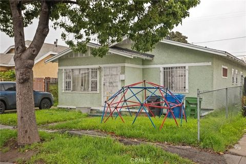 Photo of 1518 W 65th Place, Los Angeles, CA 90047 (MLS # SB26001491)