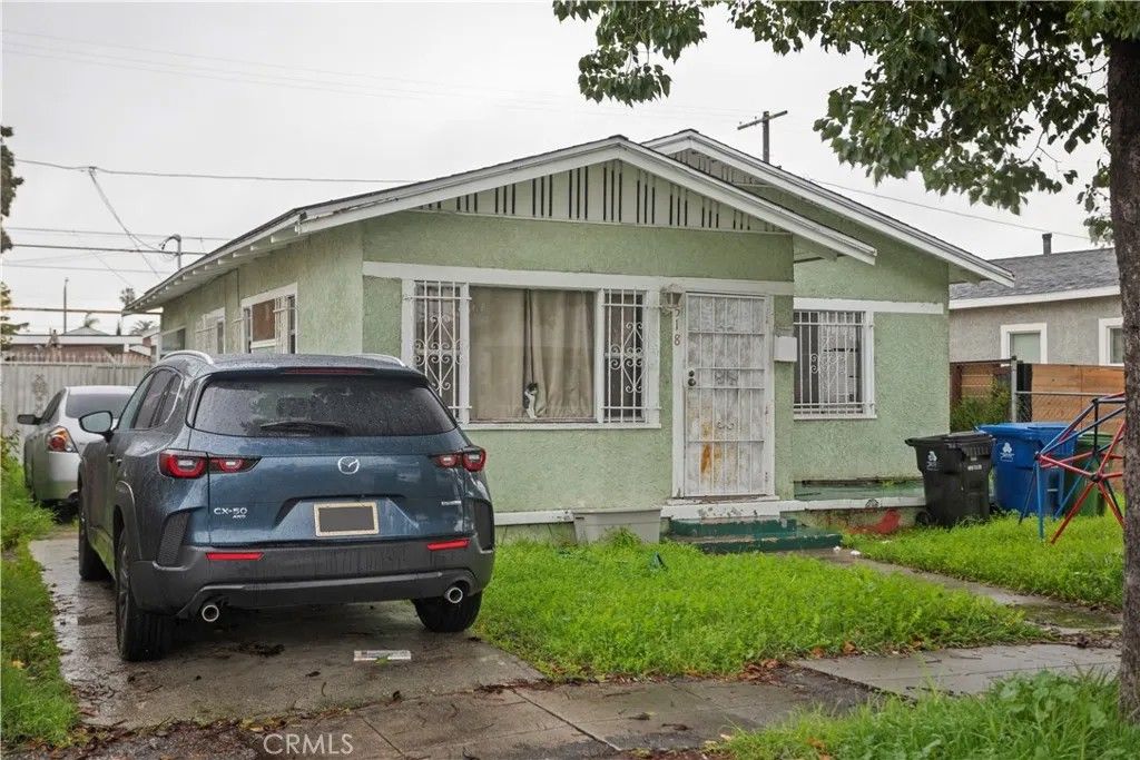 Photo of 1518 W 65th Pl, Los Angeles, CA 90047 (MLS # SB26001491)