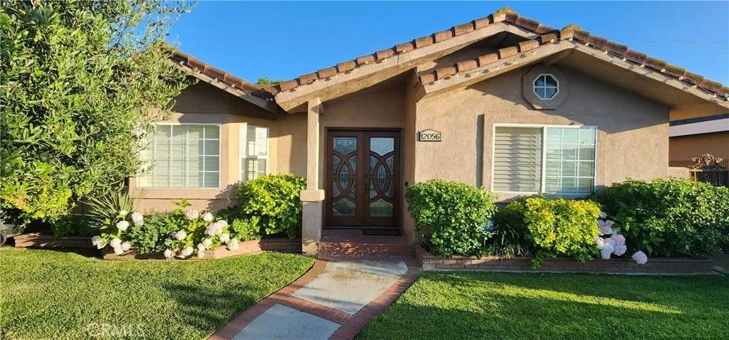 Photo of 12056 Charlwood Street, Artesia, CA 90701 (MLS # RS25273093)