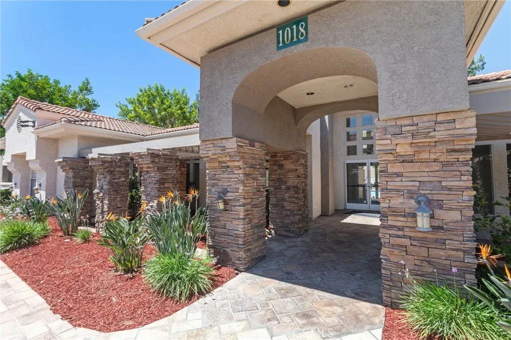 Photo of 1005 Vista Del Cerro Drive #103, Corona, CA 92879 (MLS # OC26162549)
