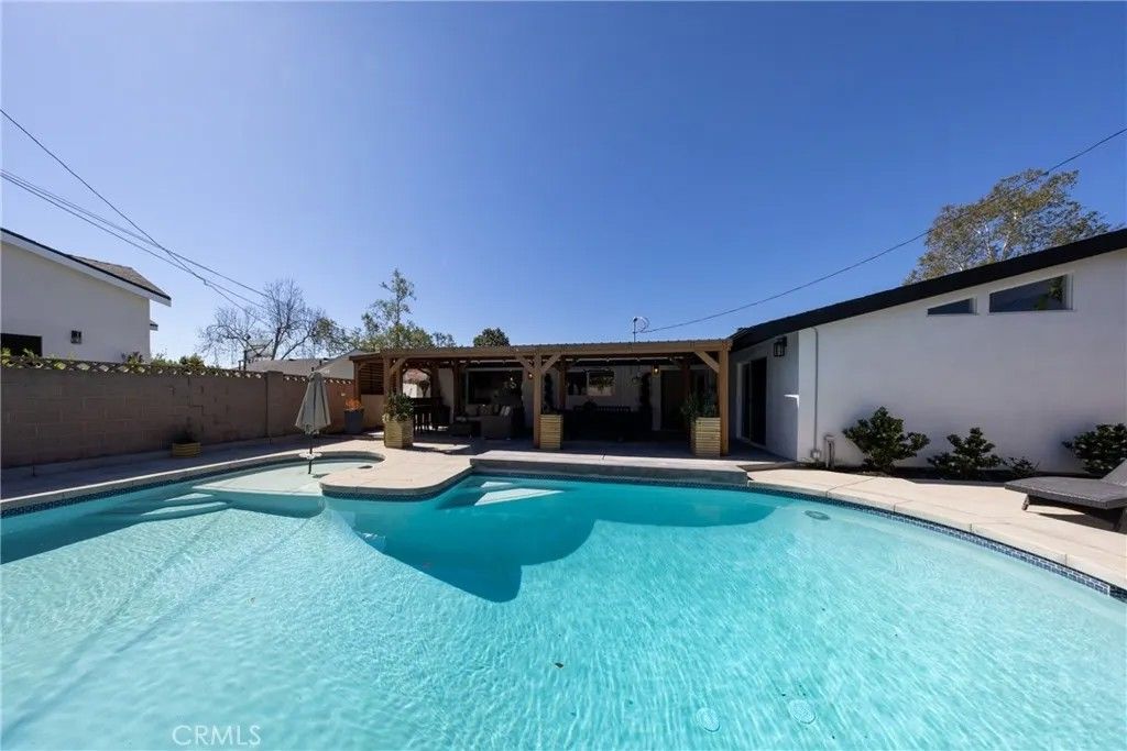 Photo of 12746 Martha Ann Dr, Los Alamitos, CA 90720 (MLS # PW26047016)