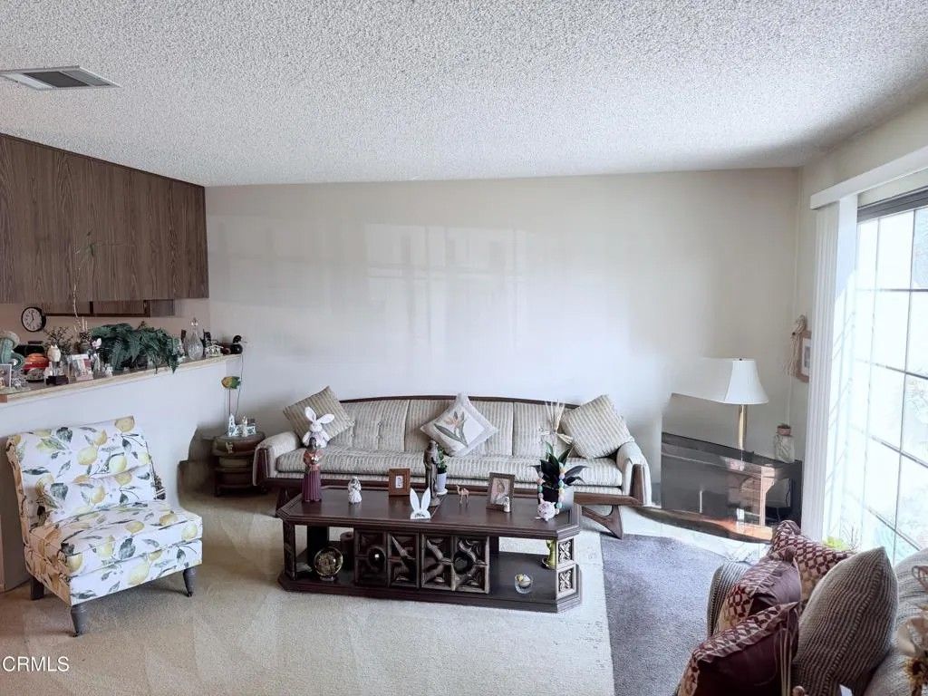 Photo of 13900 Studebaker Rd #24, Norwalk, CA 90650 (MLS # P1-26665)