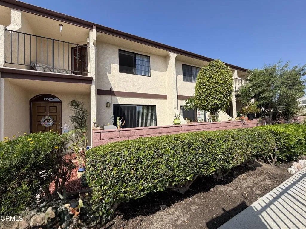 Photo of 13900 Studebaker Rd #24, Norwalk, CA 90650 (MLS # P1-26665)