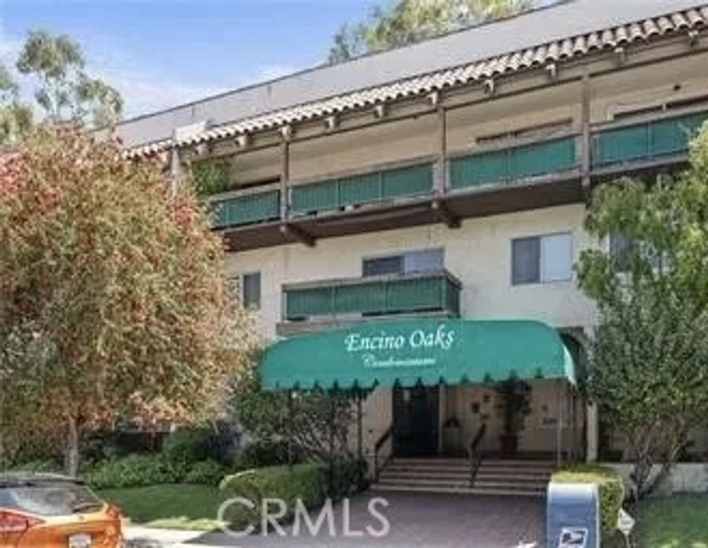 Photo of 5460 White Oak Ave #A318, Encino, CA 91316 (MLS # SR25272625)