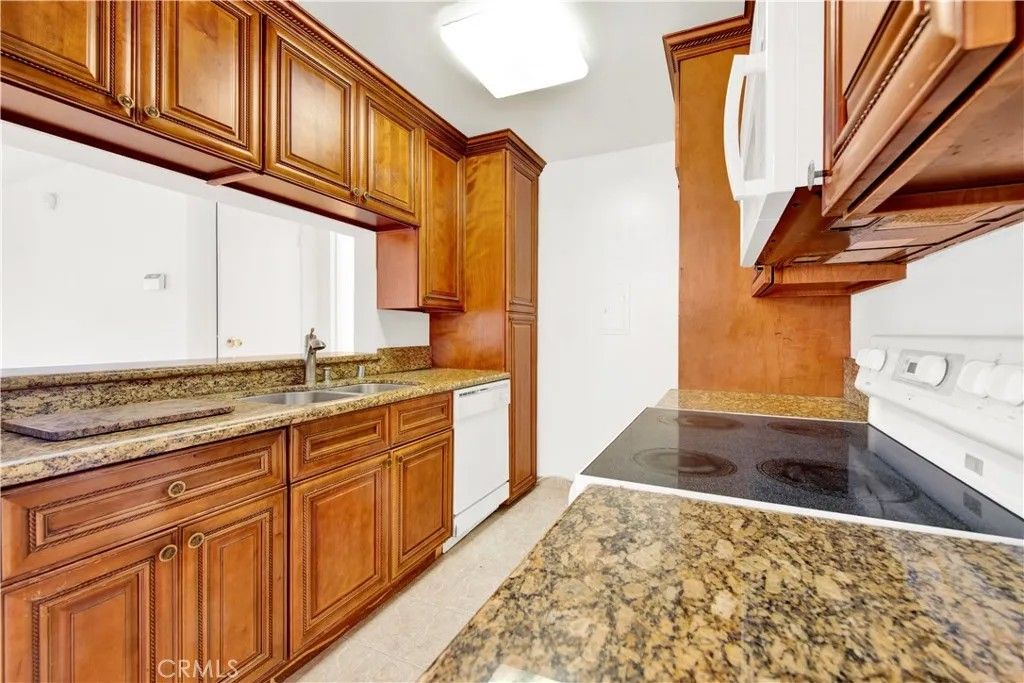 Photo of 5460 White Oak Ave #A318, Encino, CA 91316 (MLS # SR25272625)