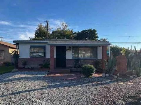 Photo of 8932 Gallatin Rd, Pico Rivera, CA 90660 (MLS # PW26005701)