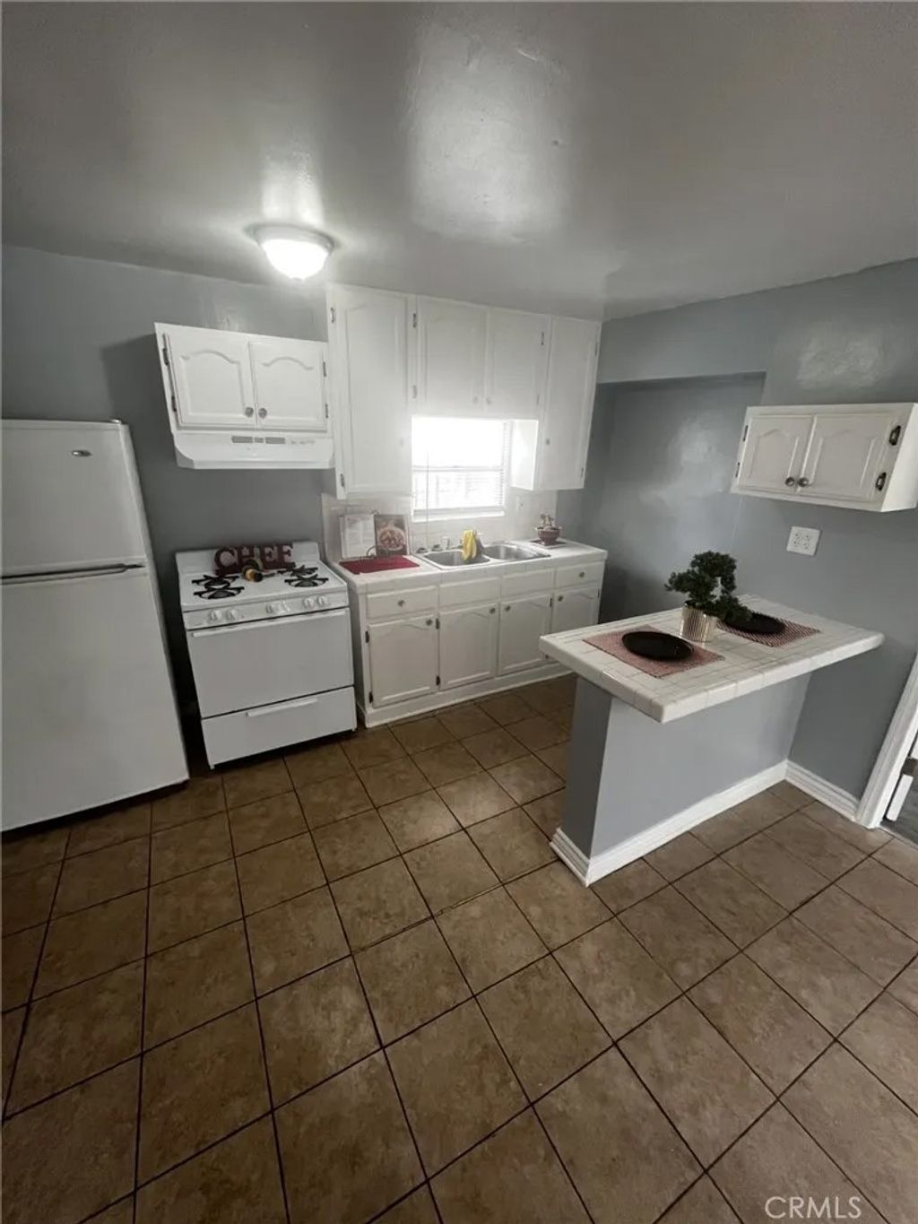 Photo of 4520 S Normandie, Los Angeles, CA 90037 (MLS # PW26112675)