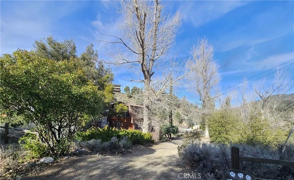 Photo of 2421 Galcier Drive, Pine Mountain Club, CA 93222 (MLS # SR26013350)