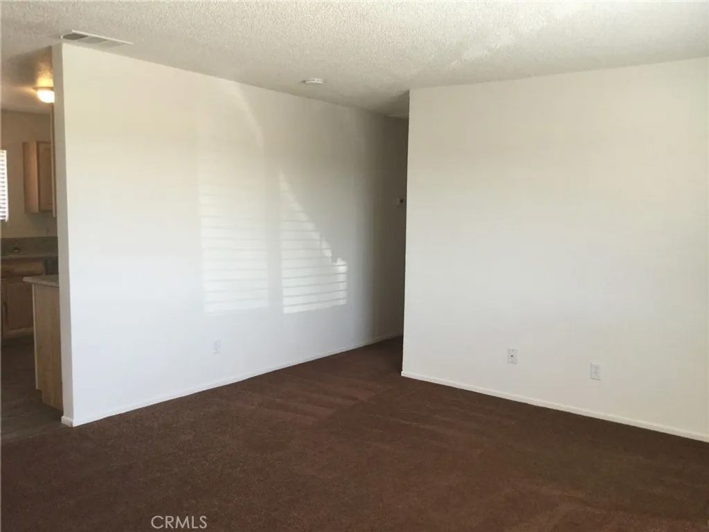 Photo of 18824 Bellflower Street #A, Adelanto, CA 92301 (MLS # HD25253445)