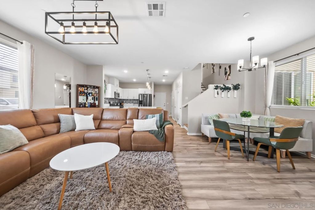 Photo of 5223 Surfwalk Way #111, San Diego, CA 92154 (MLS # 260008791)