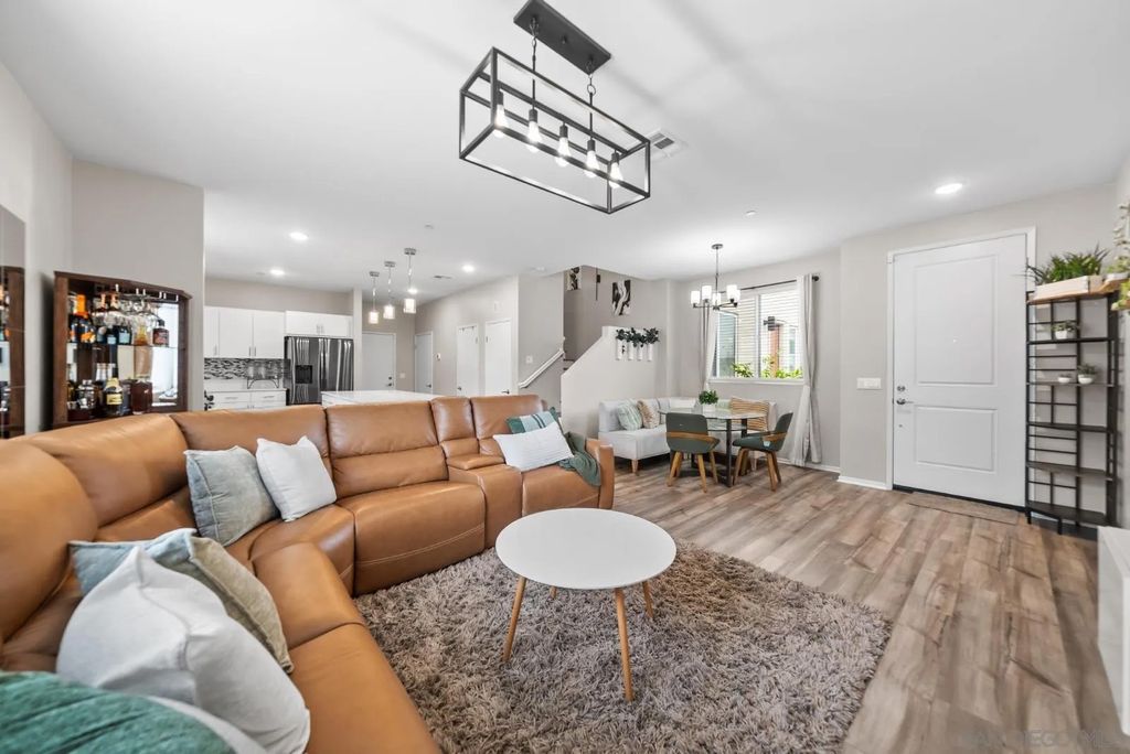 Photo of 5223 Surfwalk Way #111, San Diego, CA 92154 (MLS # 260008791)