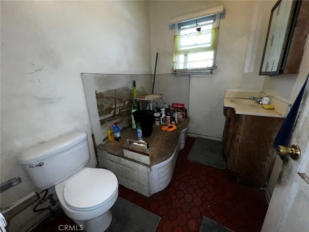 Photo of 111 N Belle Avenue, Corona, CA 92882 (MLS # IV26012936)