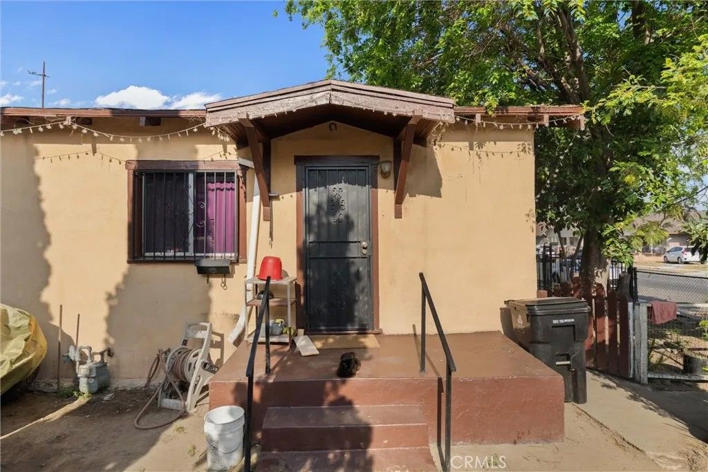 Photo of 1350 E 43rd Pl, Los Angeles, CA 90011 (MLS # DW26079634)