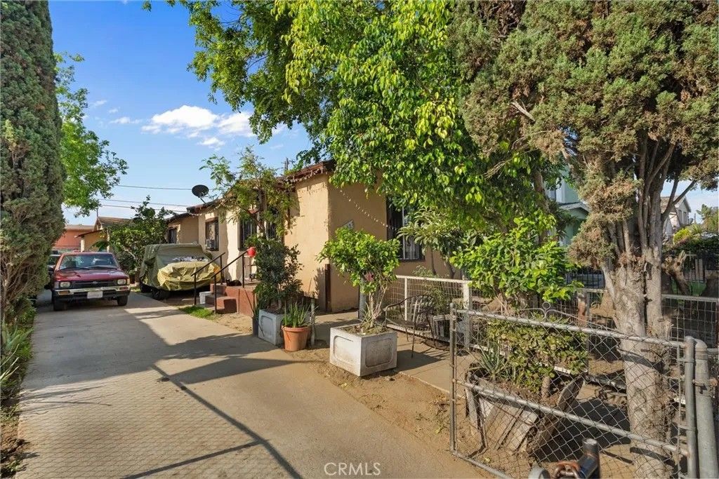 Photo of 1350 E 43rd Pl, Los Angeles, CA 90011 (MLS # DW26079634)