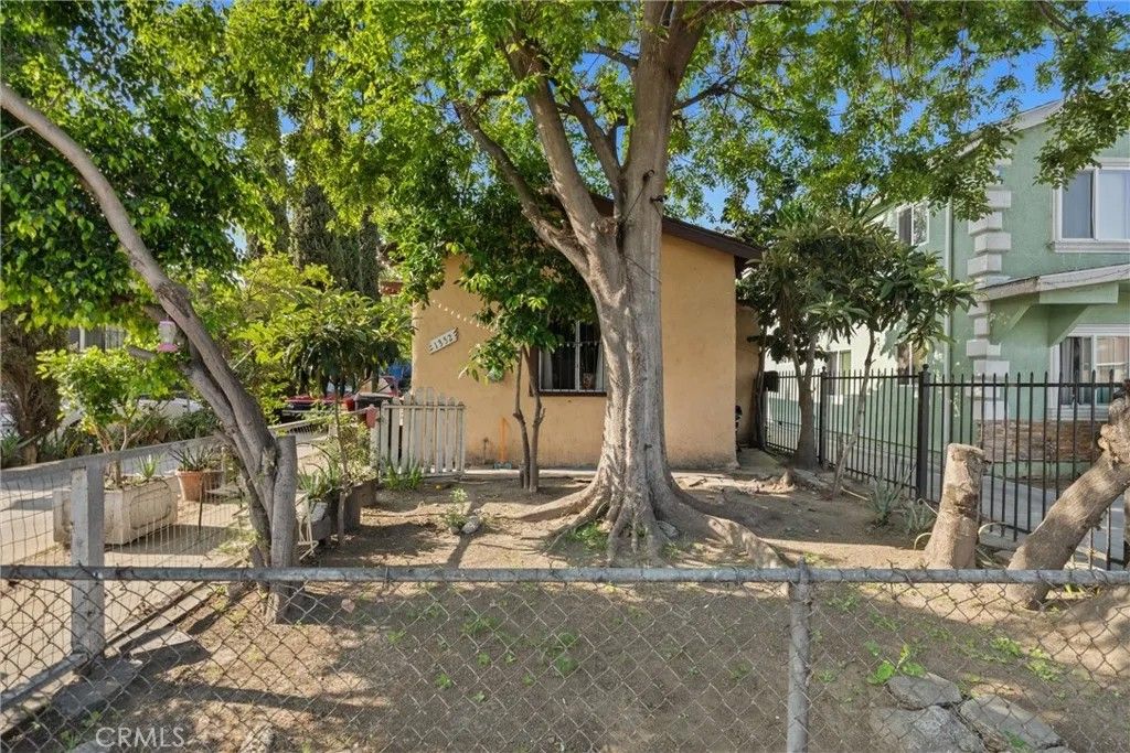 Photo of 1350 E 43rd Pl, Los Angeles, CA 90011 (MLS # DW26079634)
