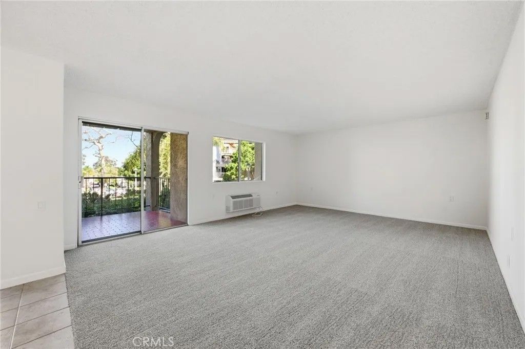 Photo of 3243 San Amadeo #1F, Laguna Woods, CA 92637 (MLS # OC26021492)