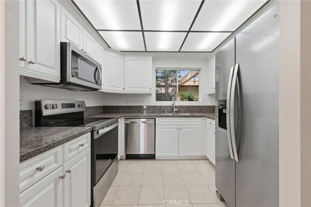 Photo of 3243 San Amadeo #1F, Laguna Woods, CA 92637 (MLS # OC26021492)