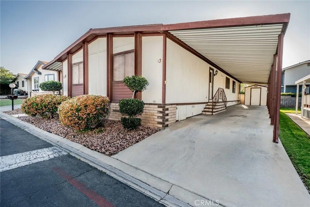 Photo of 1550 Rimpau Ave #13, Corona, CA 92881 (MLS # IG26065487)