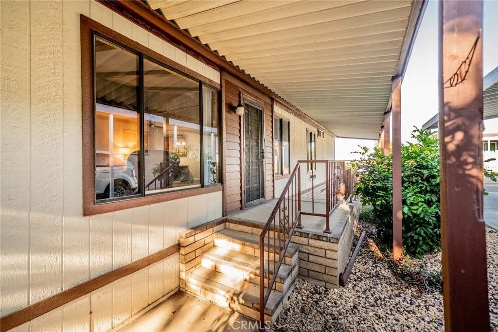 Photo of 1550 Rimpau Ave #13, Corona, CA 92881 (MLS # IG26065487)