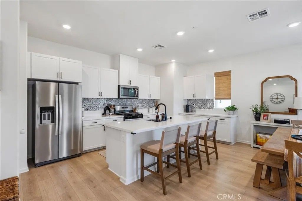 Photo of 1060 Kendale Way, Vista, CA 92081 (MLS # SW26000036)