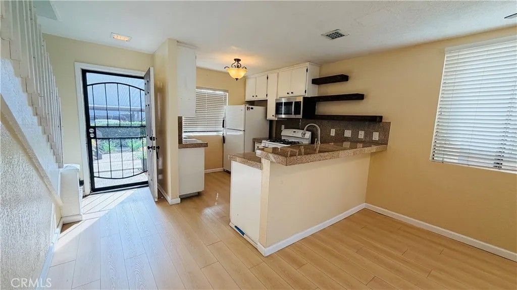 Photo of 12750 Centralia St, Lakewood, CA 90715 (MLS # SB26068668)