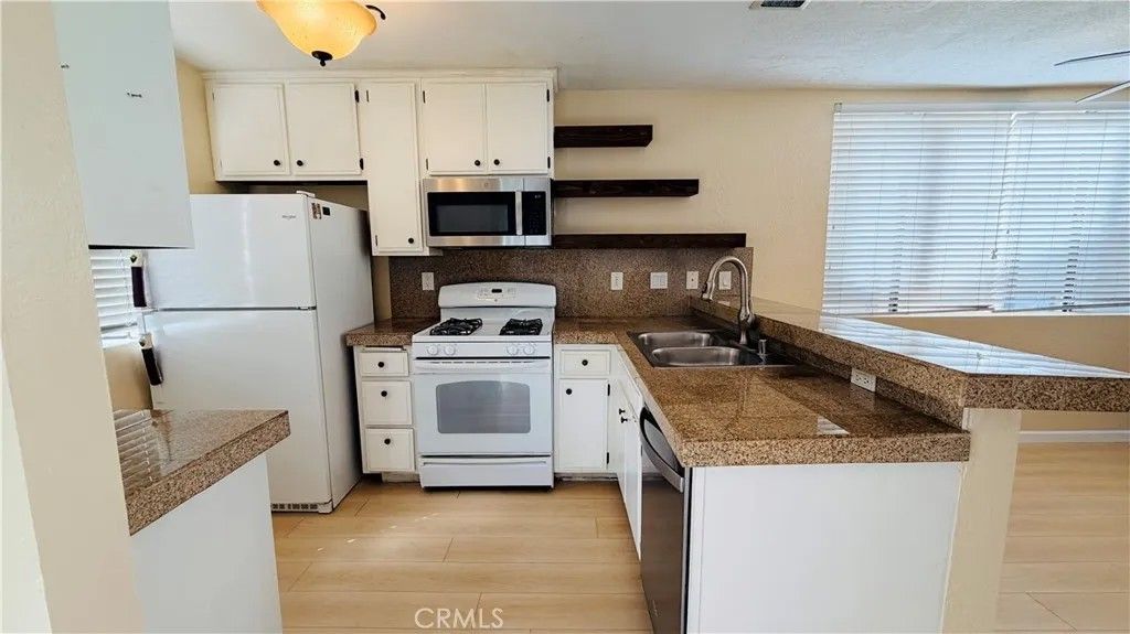 Photo of 12750 Centralia St, Lakewood, CA 90715 (MLS # SB26068668)