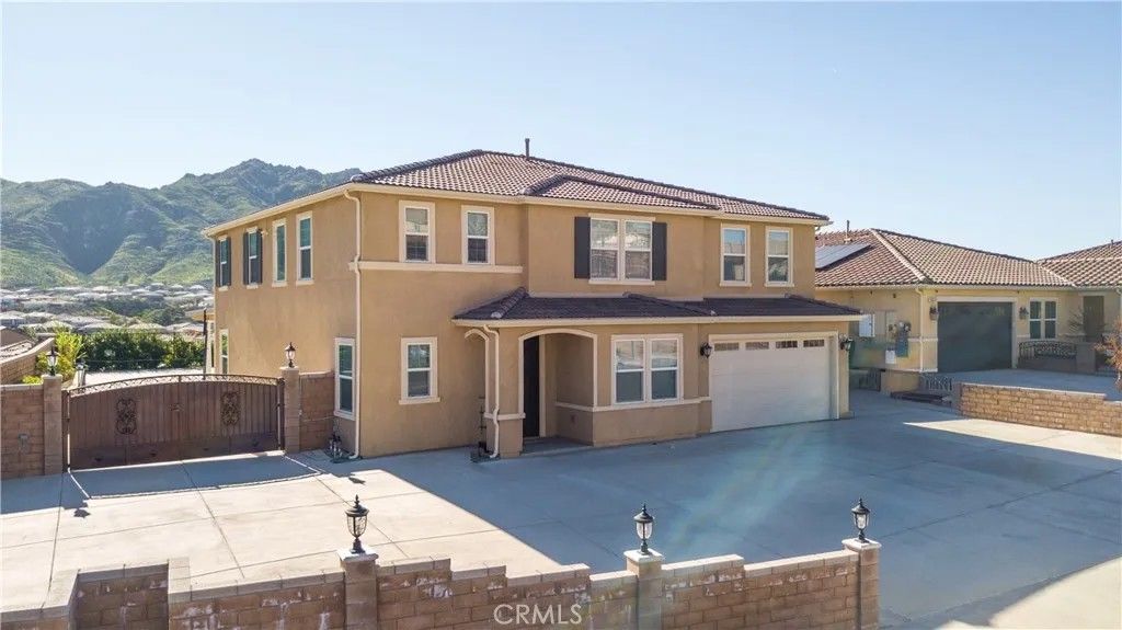 Photo of 21047 Iron Rail Dr, Riverside, CA 92507 (MLS # IV25271625)