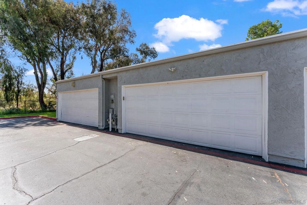 Photo of 9401 Carlton Oaks Drive #E, Santee, CA 92071 (MLS # 260007136)