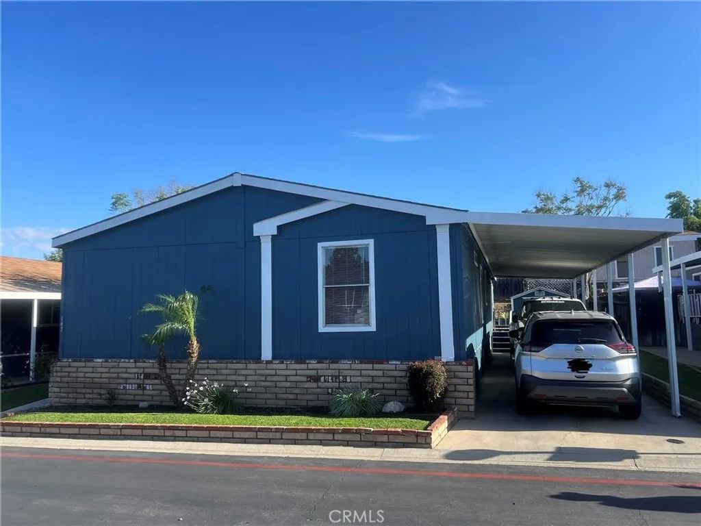 Photo of 1550 Rimpau Ave #147, Corona, CA 92881 (MLS # IG26081762)