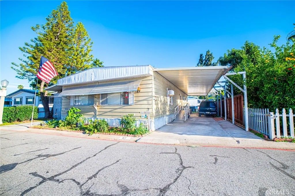 Photo of 3883 Buchanan St #67, Riverside, CA 92503 (MLS # IV25281250)