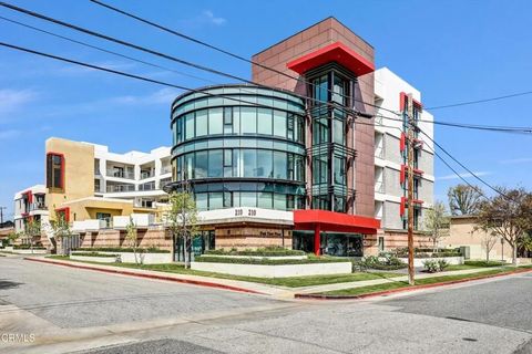 Photo of 210 N Monterey Street #409, Alhambra, CA 91801 (MLS # P1-26207)