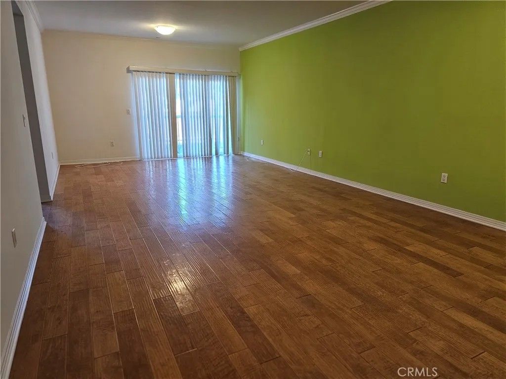 Photo of 214 S Alexandria Ave #203, Los Angeles, CA 90004 (MLS # AR25273398)