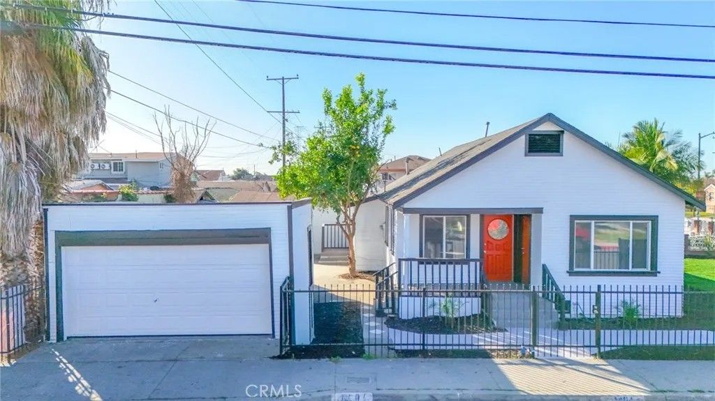 Photo of 1404 E 87th Place, Los Angeles, CA 90002 (MLS # DW26022194)