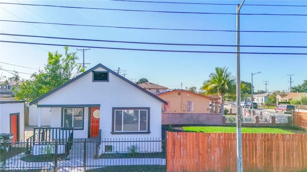 Photo of 1404 E 87th Place, Los Angeles, CA 90002 (MLS # DW26022194)