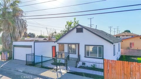 Photo of 1404 E 87th Place, Los Angeles, CA 90002 (MLS # DW26022194)