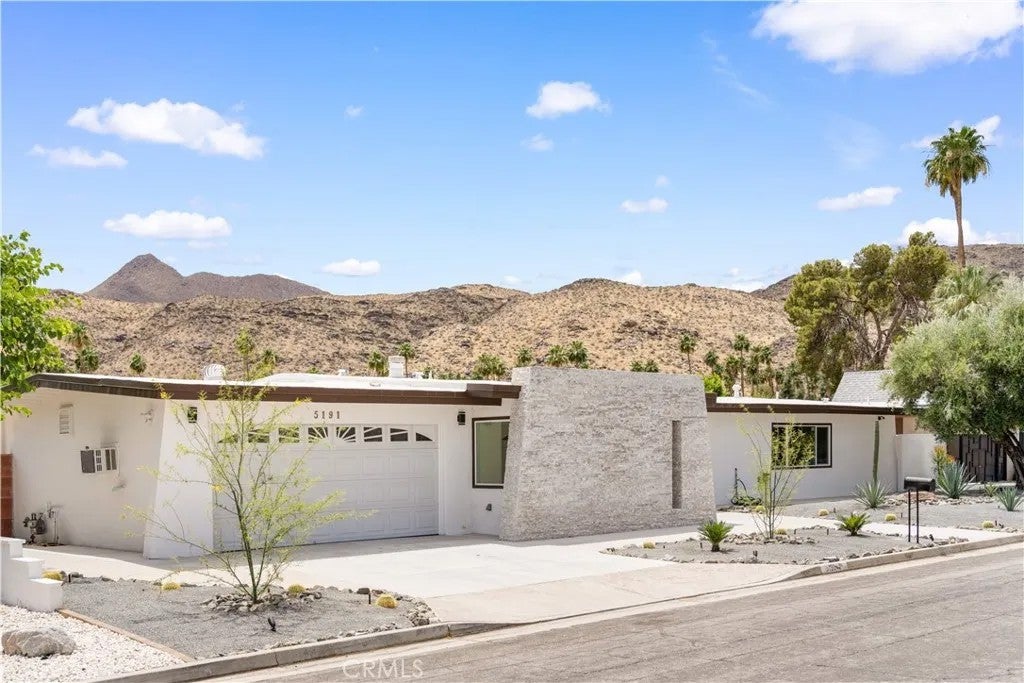 Photo of 5191 E Lakeside Dr, Palm Springs, CA 92264 (MLS # OC26109515)