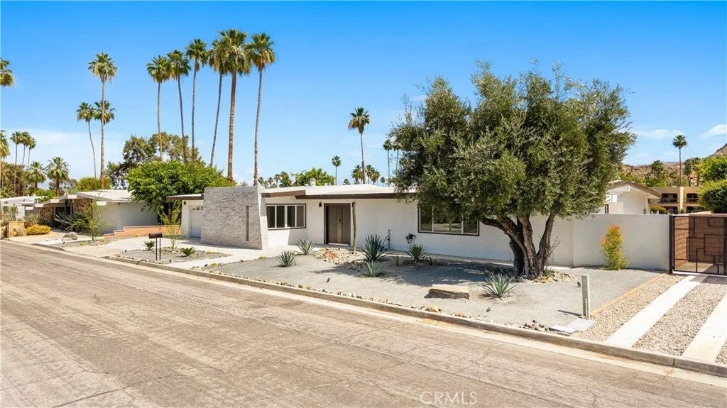Photo of 5191 E Lakeside Dr, Palm Springs, CA 92264 (MLS # OC26109515)