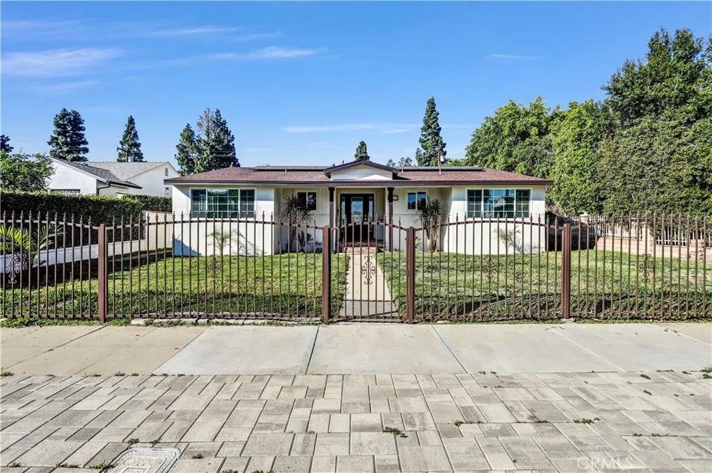 Photo of 14857 Tuba St, Mission Hills (san Fernando), CA 91345 (MLS # GD26060214)