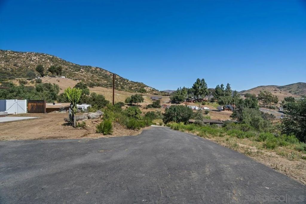 Photo of 14719 Quail Haven Ln, El Cajon, CA 92019 (MLS # 260007967)