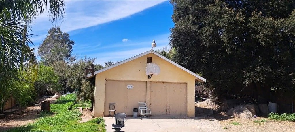 Photo of 25767 Creag Avenue, Homeland, CA 92548 (MLS # PW26048274)