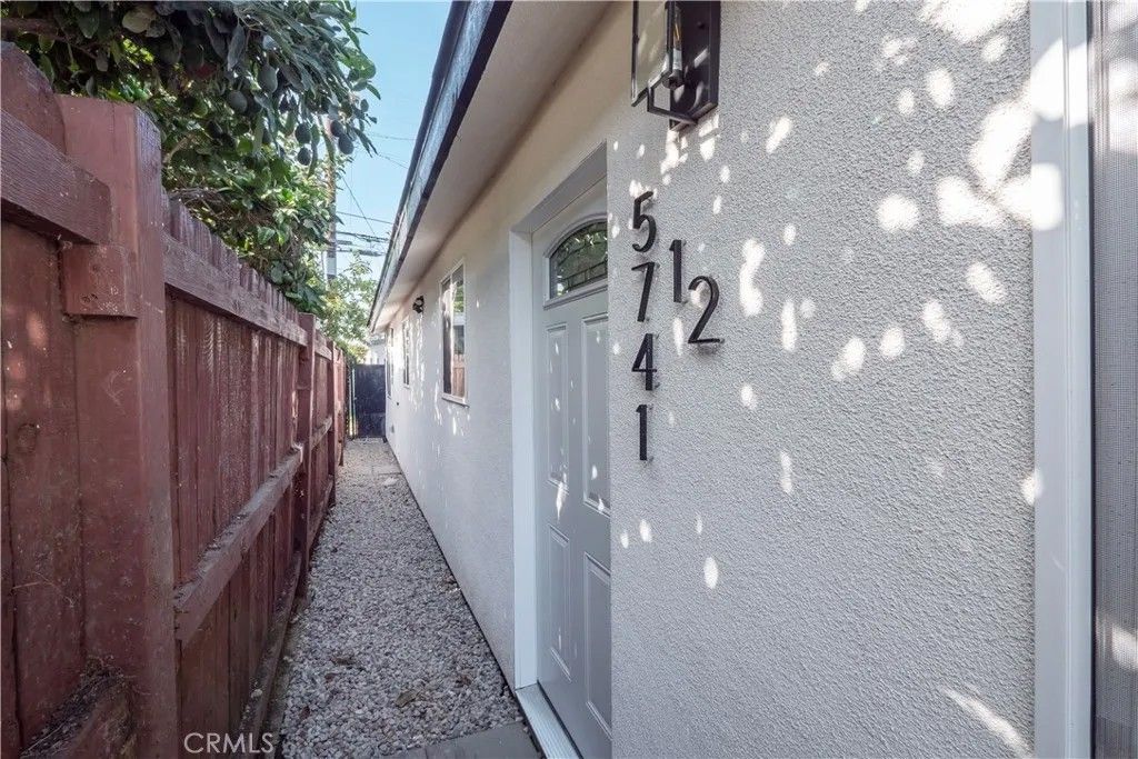 Photo of 5739 S St Andrews Pl, Los Angeles, CA 90062 (MLS # DW26043927)