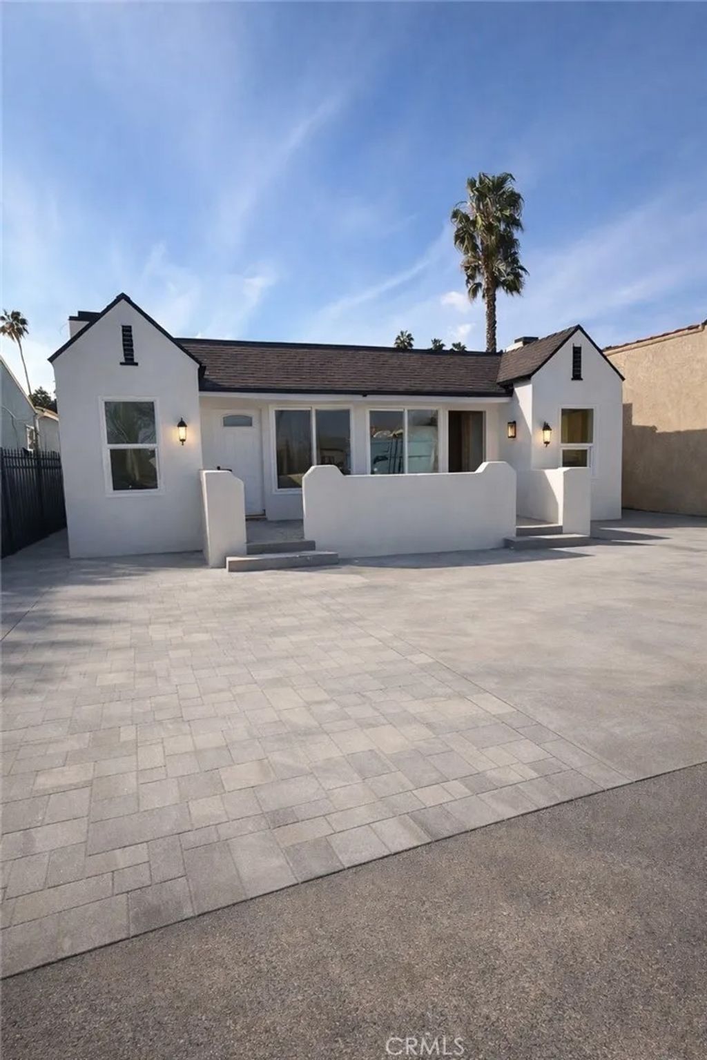 Photo of 5739 S St Andrews Pl, Los Angeles, CA 90062 (MLS # DW26043927)