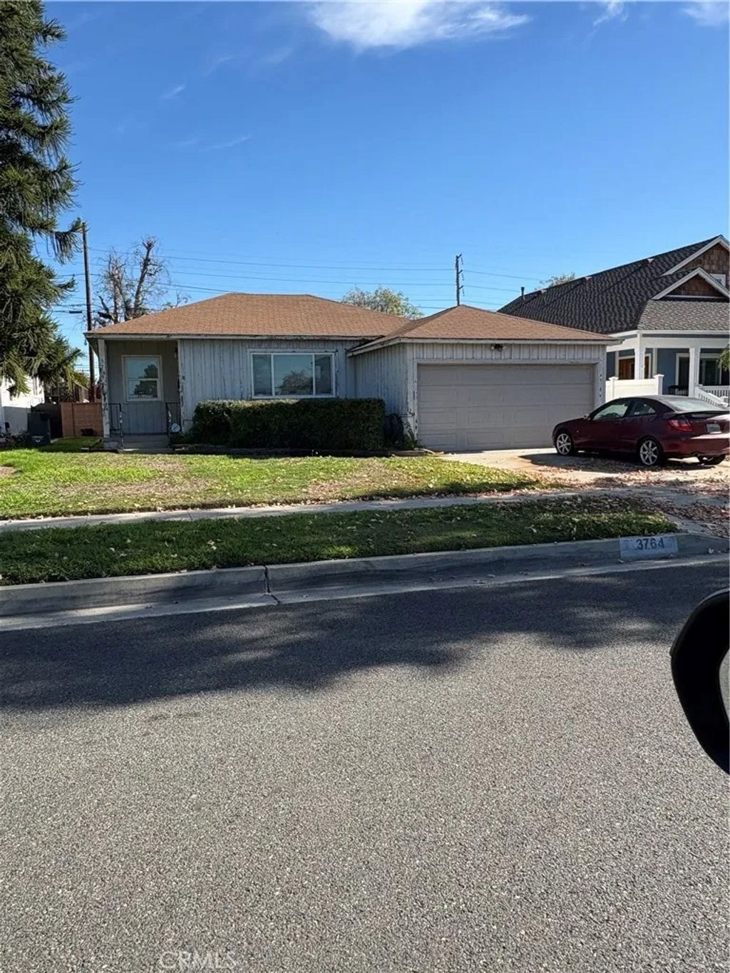 Photo of 3764 Conquista Ave, Long Beach, CA 90808 (MLS # RS26017309)