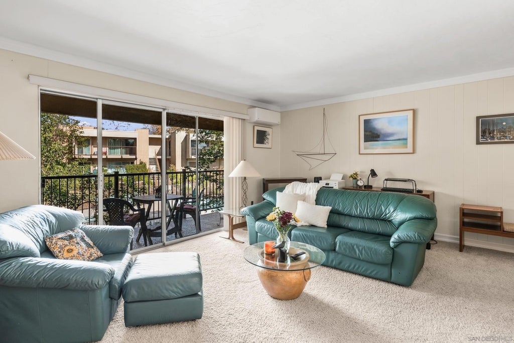 Photo of 5700 Baltimore Dr #107, La Mesa, CA 91942 (MLS # 260025853)