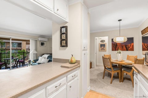 Photo of 5700 Baltimore Dr #107, La Mesa, CA 91942 (MLS # 260025853)